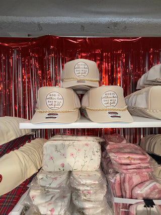 God is within her hat with chain