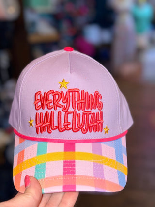 Light purple hat with 'Everything Hallelujah' embroidered in red and a multicolor plaid brim.