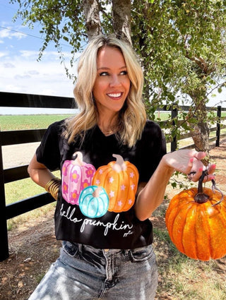 Black V-neck t-shirt with colorful pumpkin graphic and 'hello pumpkin' text.