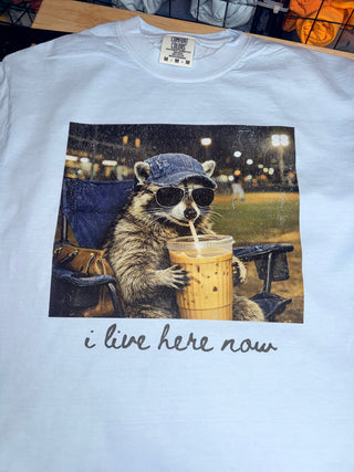 I live here now racoon graphic tee