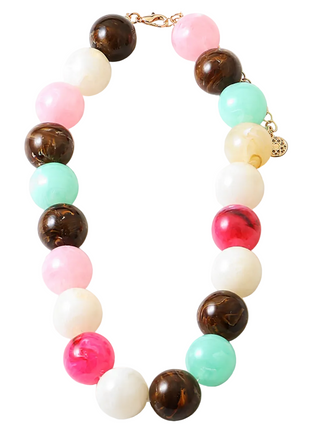 Colorful beaded necklace on a white background